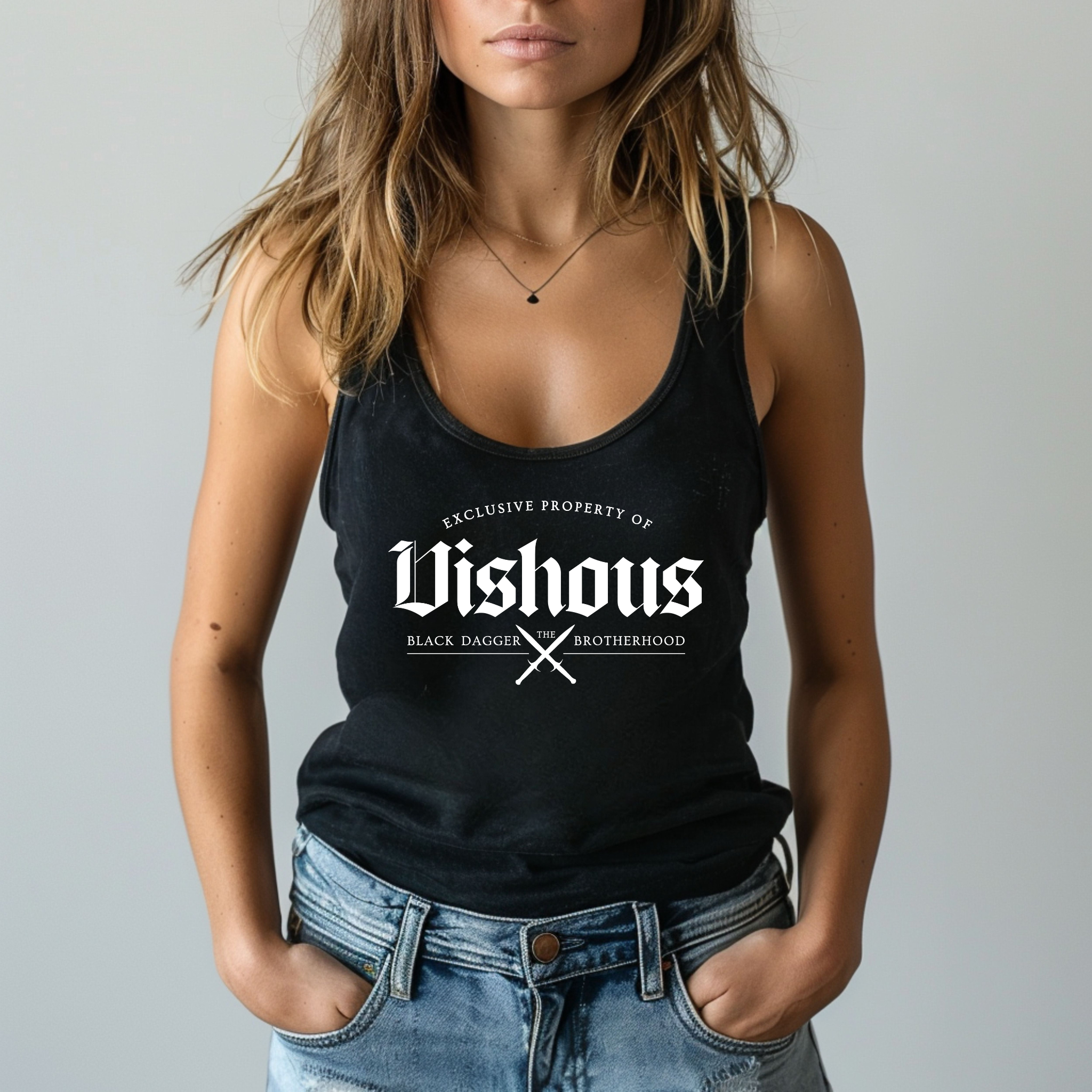 a woman wears a black tank top with the words "property of Vishous: the Black Dagger Brotherhood" with 2 daggers crossed