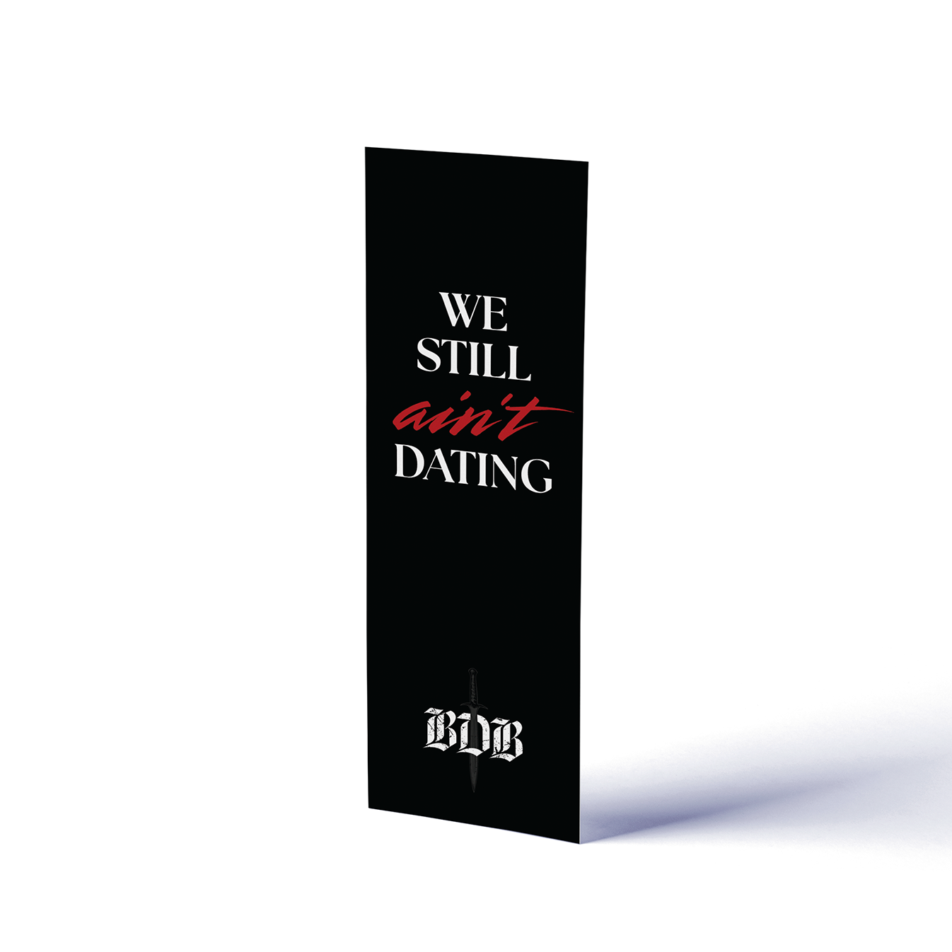 Black book titled 'We Still Ain't Dating' with a white background