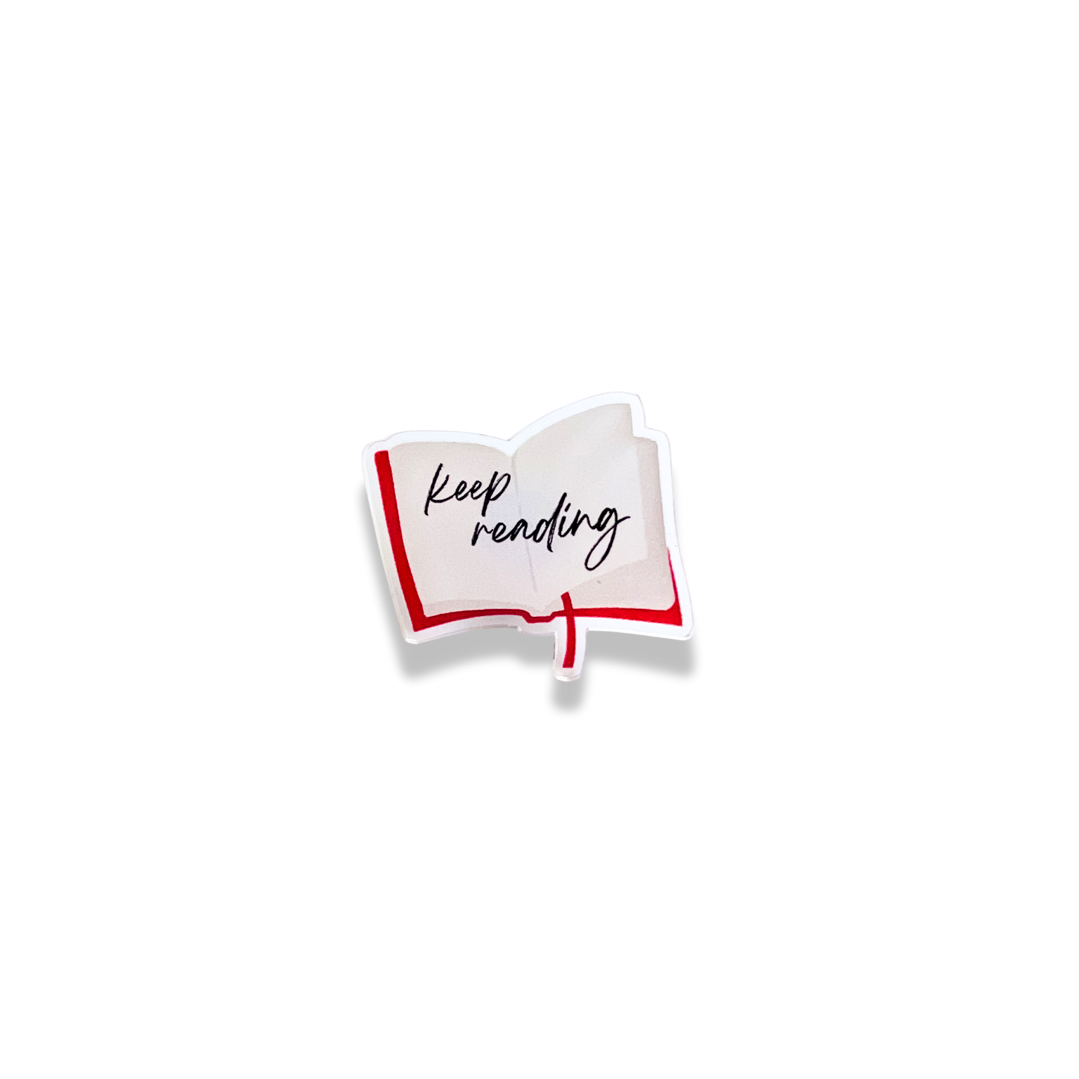 Pin of a book with 'Keep reading' text on a white background