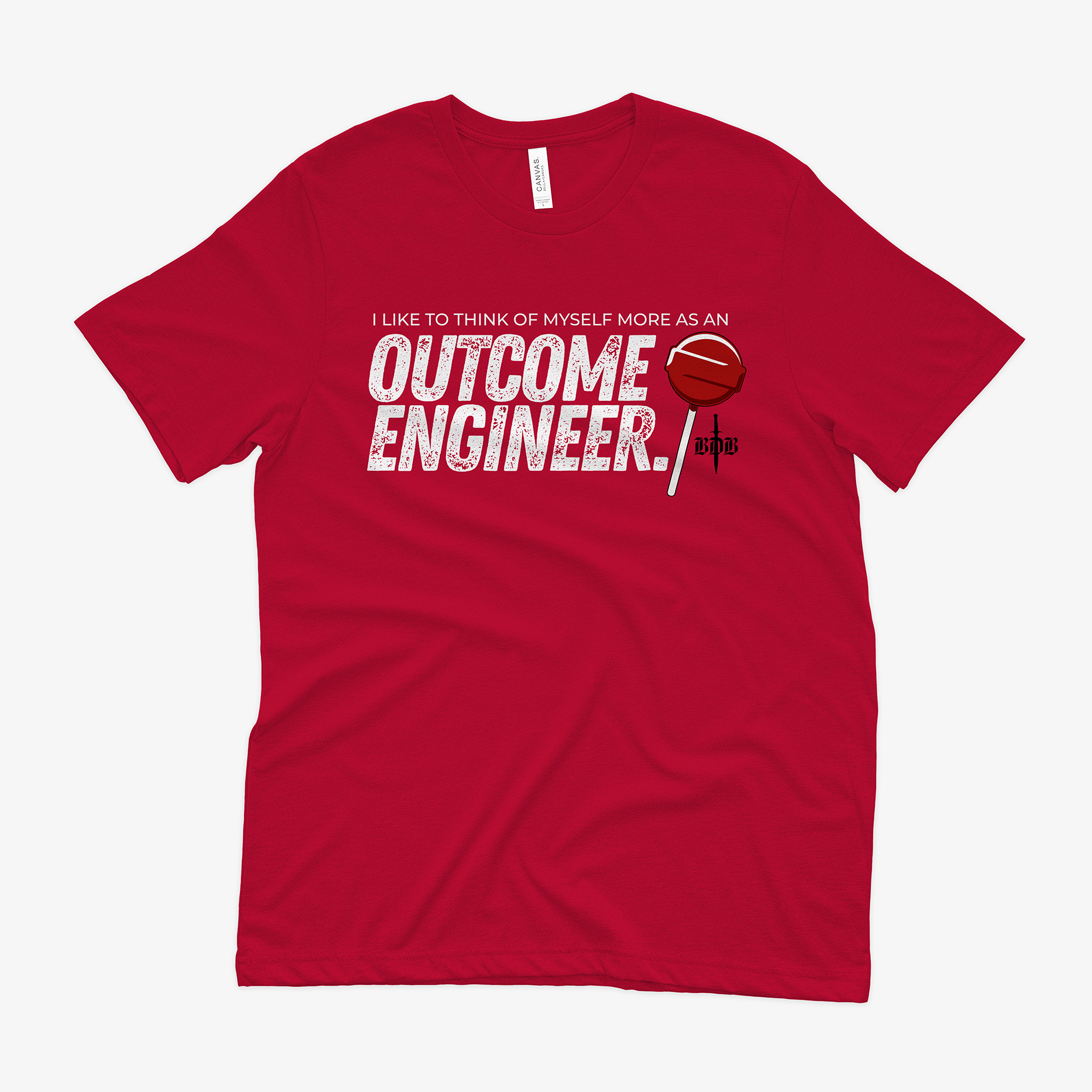 a red shirt with the words "I like to think of myself as an outcome engineer" emblazoned on the front next to a red tootsie pop.