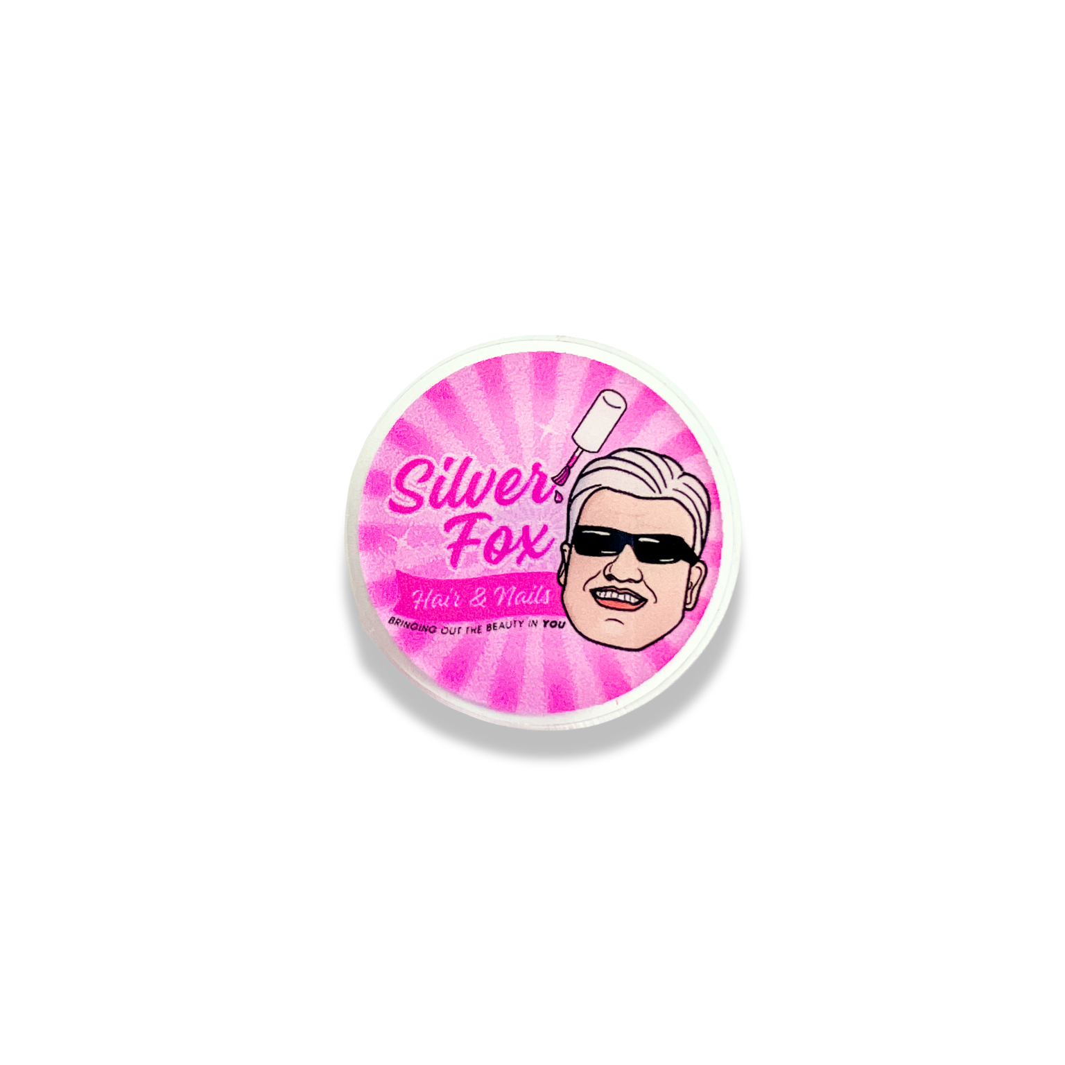 pink pin with retro logo design "Silver Fox Hair & Nails" with a cartoon man's face