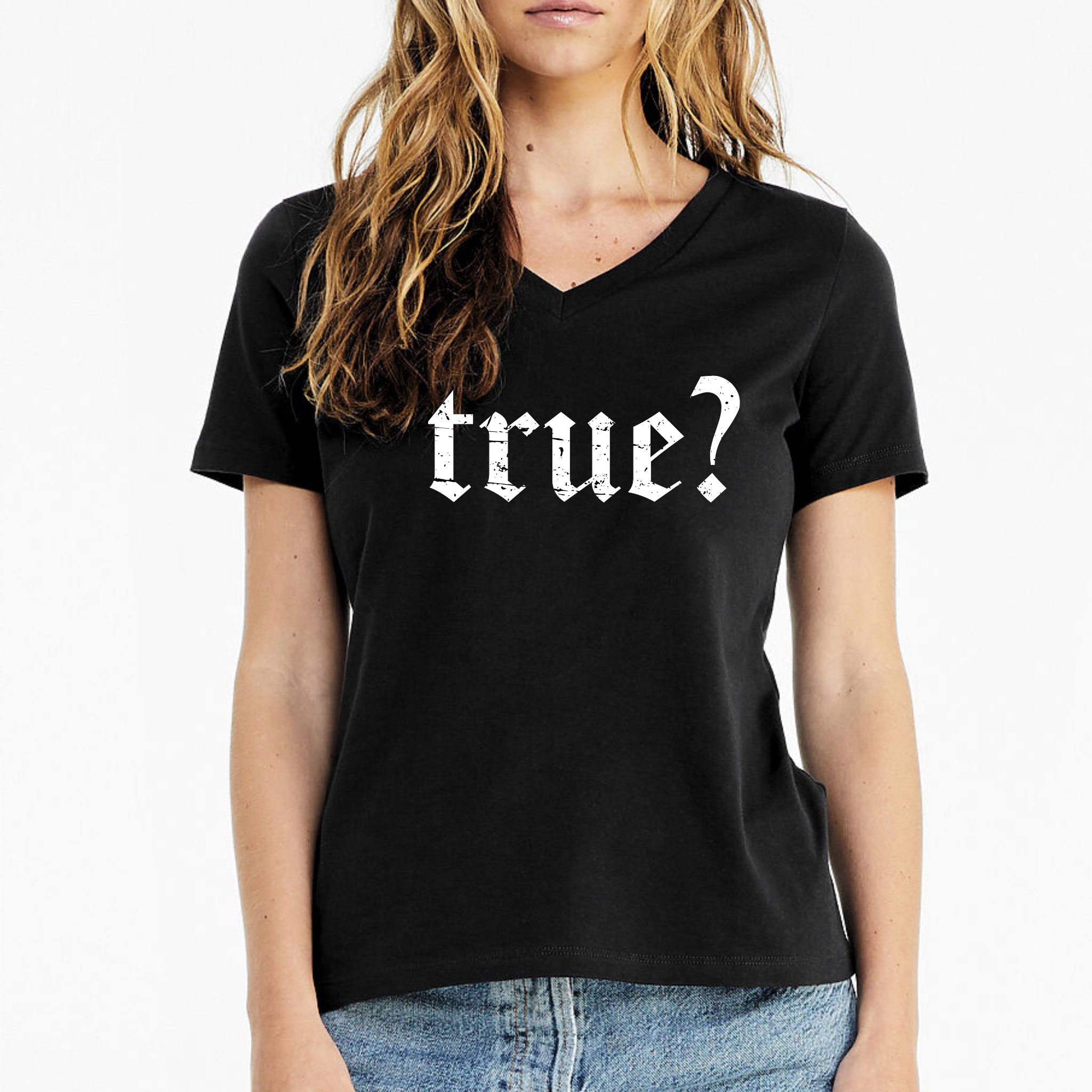 Person wearing a black t-shirt with 'true?' printed on it against a white background