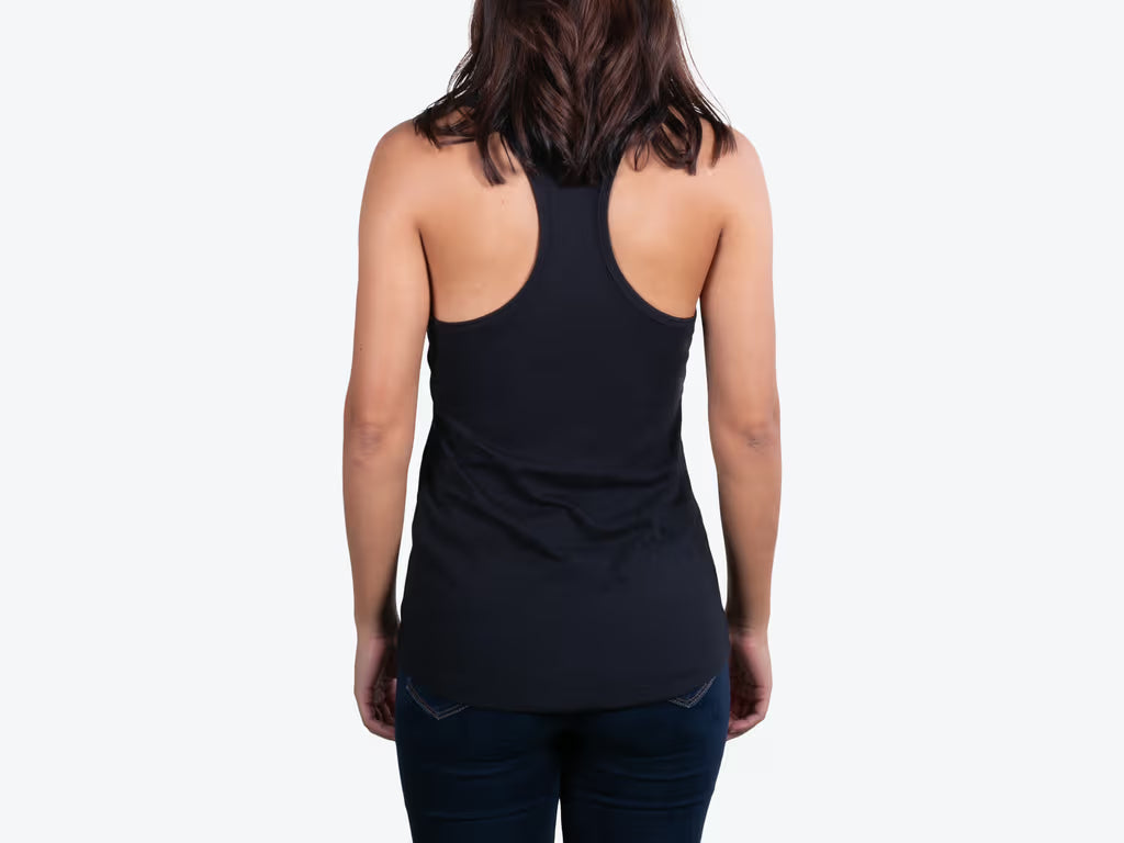 Person wearing a black tank top on a white background