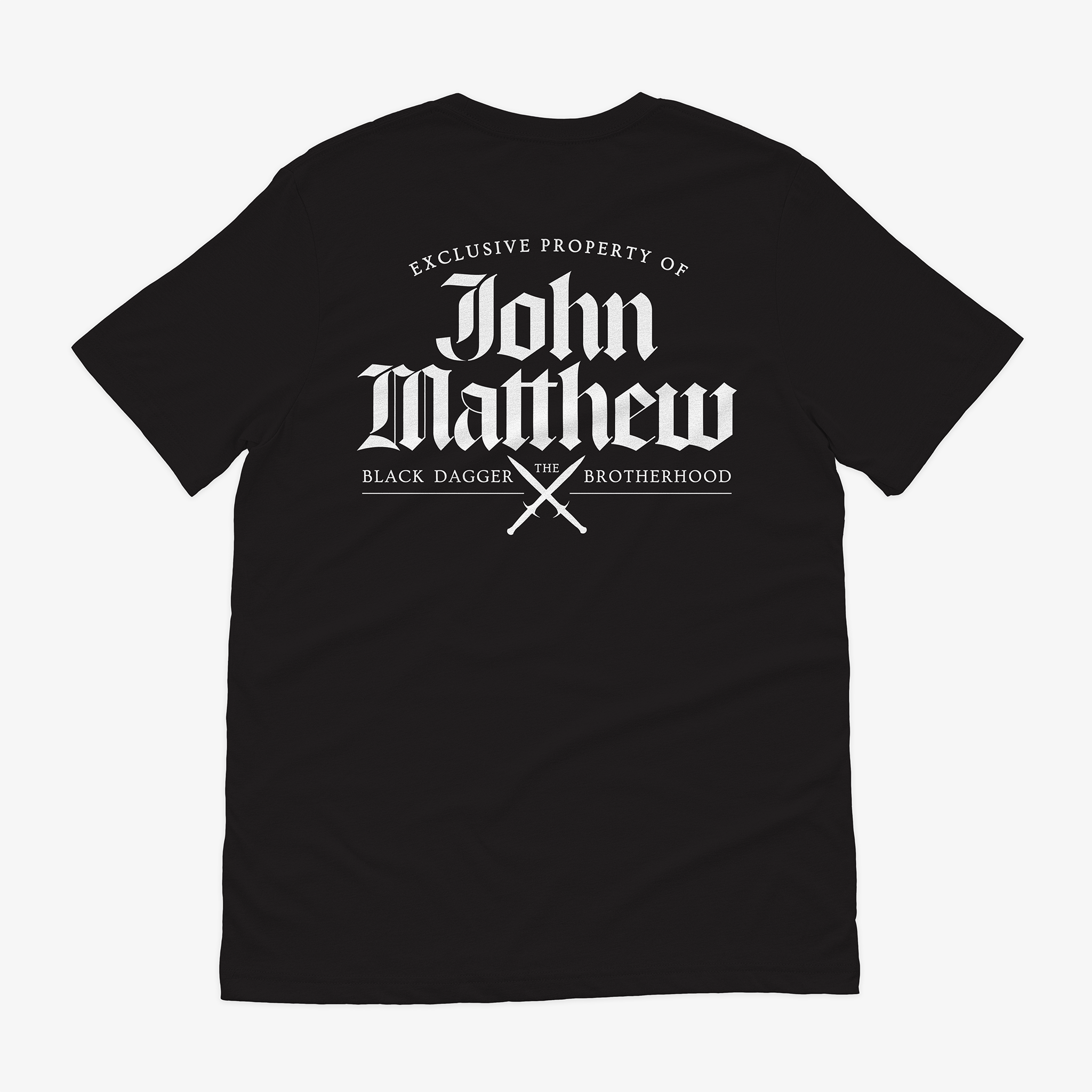the back of a black shirt that says "exclusive property of John Matthew"
