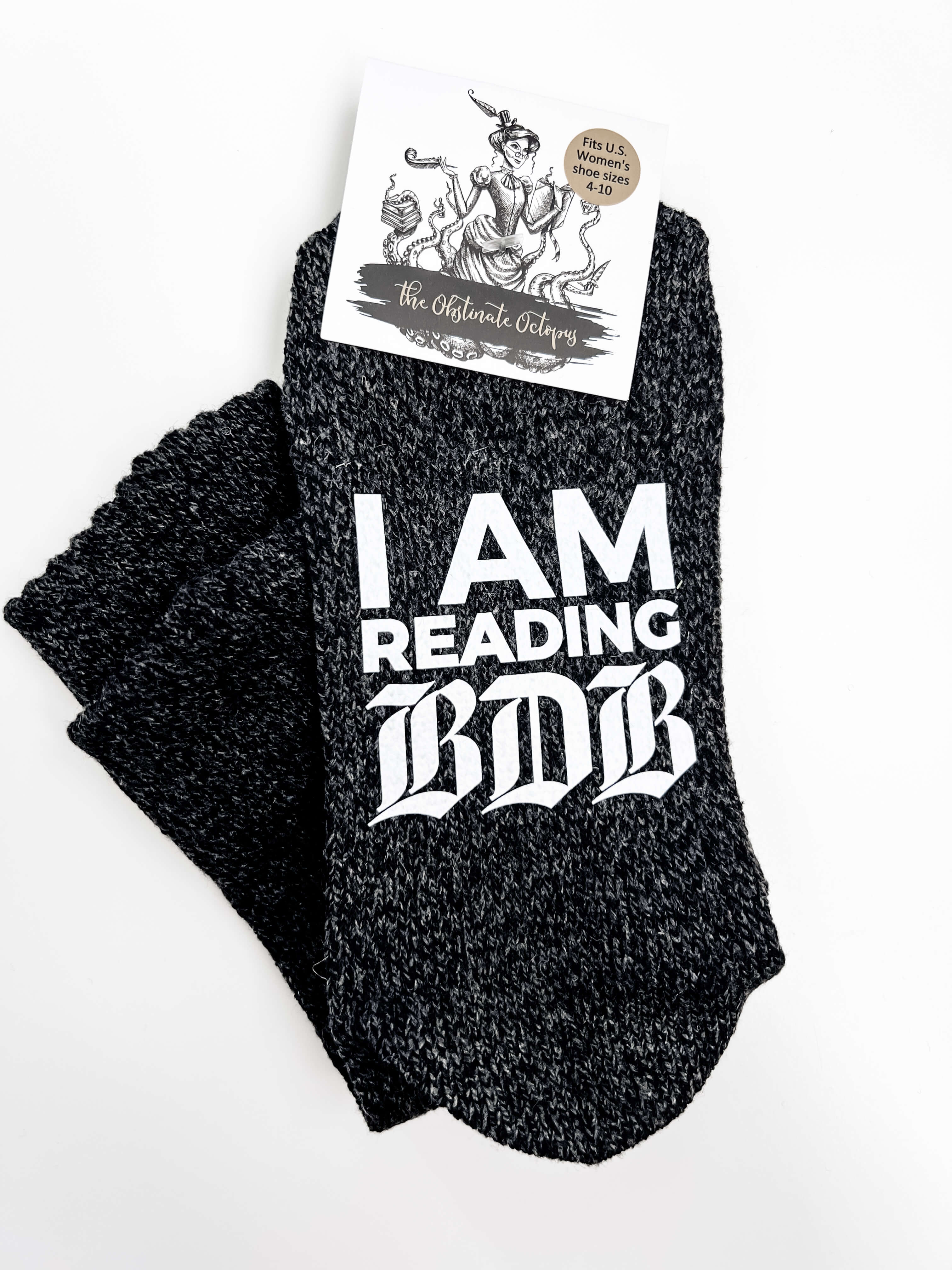 Black socks with 'I AM READING BDB' text on a white background