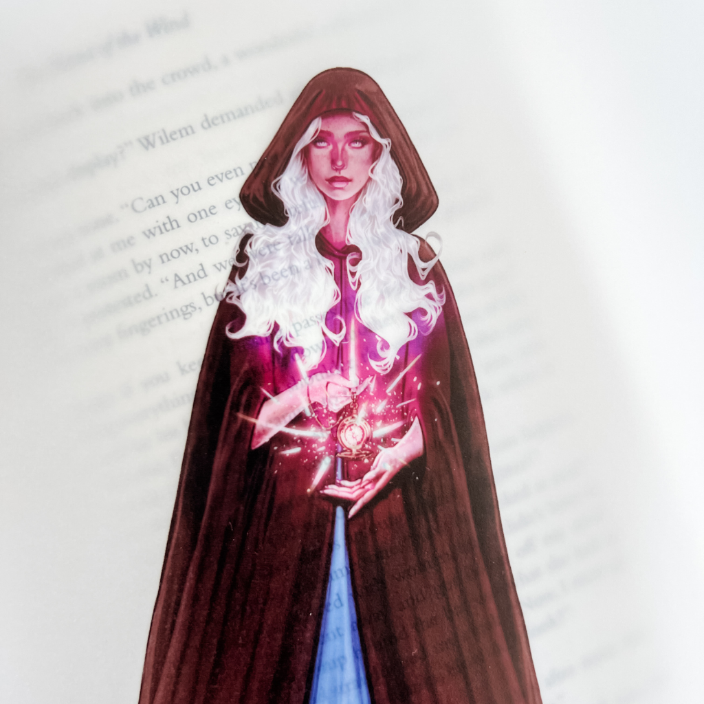 Sorrel in a dark cloak with glowing pink energy 