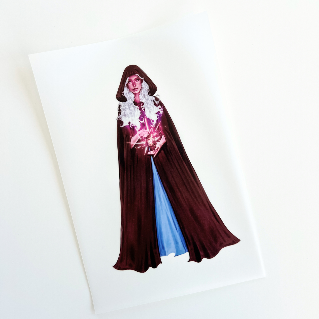 Sorrel in a long dark brown cloak holding the compass on a white background